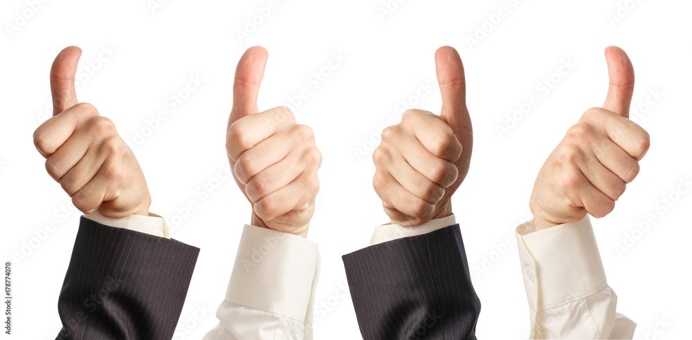 Four hands show thumbs up sign Four hands show thumbs up sign