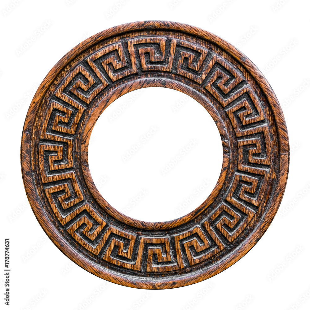 Round brown wooden decorative element with ornament on white background, isolated
