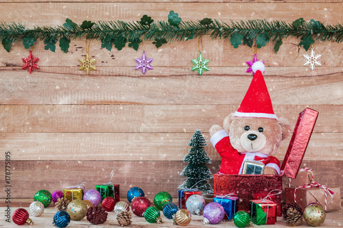 Teddy Bear in Santa Cross Dress with gift box