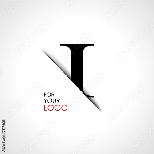 Capital i letter is inserted in the paper slot. To create logos, emblems, monograms.