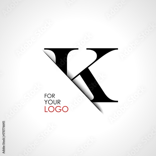 Capital k letter is inserted in the paper slot. To create logos, emblems, monograms.