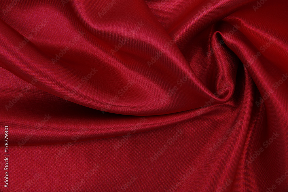 Smooth elegant red silk or satin luxury cloth texture as abstract background. Luxurious valentines day background design Smooth elegant red silk or satin luxury cloth texture as abstract background. Luxurious valentines day background design