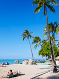 Waikiki Beach while traveling in Honolulu, Oahu island, Hawaii, USA. Waikiki Beach in the center of Honolulu has the largest number of visitors in Hawaii.