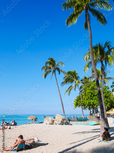 Waikiki Beach while traveling in Honolulu, Oahu island, Hawaii, USA. Waikiki Beach in the center of Honolulu has the largest number of visitors in Hawaii.