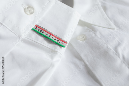 Made in Italy label on white shirt