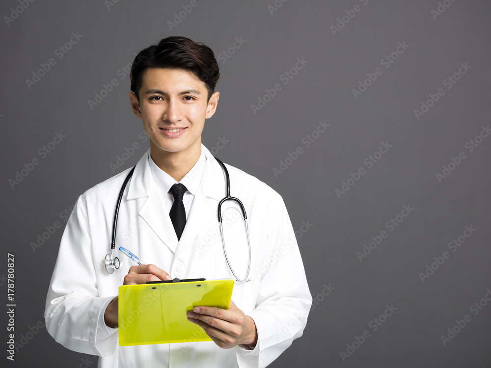 young smiling asian Doctor with stethoscope young smiling asian Doctor with stethoscope