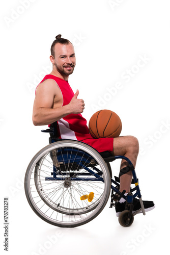 Basketball player in wheelchair showing thumb up