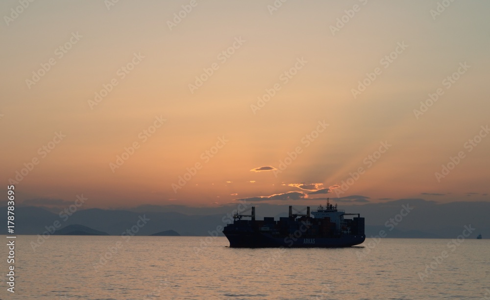 ship on the sea at sunset