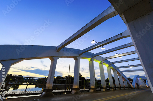 Ratsadapisek bridge at the wang river in the city of Lampang in North Thailand,