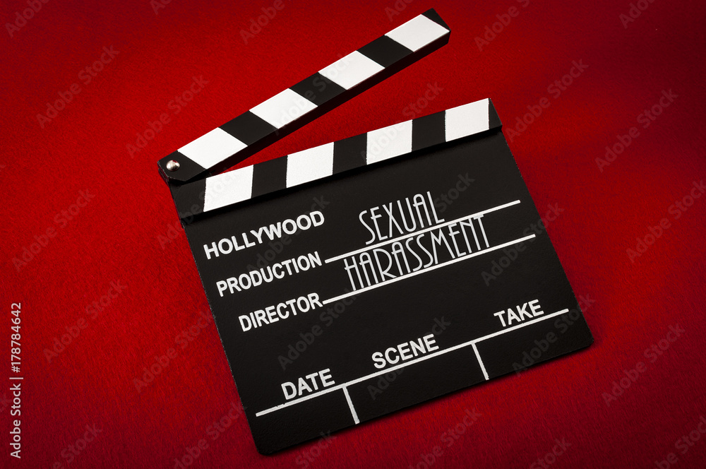 Naklejka premium Sexism and sexual harassment in hollywood concept with clapper board representing the movie industry and the text Sexual Harassment