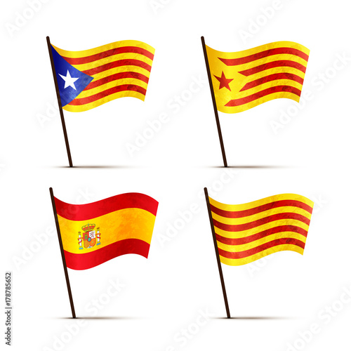 Set of free Catalan, Senyera, Estelada blava and Spain flags on a pole with shadow isolated on white photo