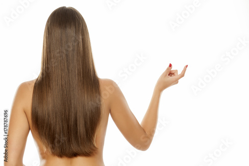 woman with long hair advertises imaginary product