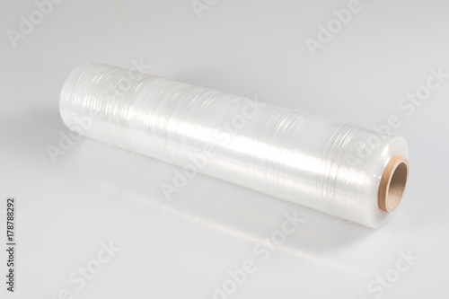 transparent film roll wrapping packaging on white background