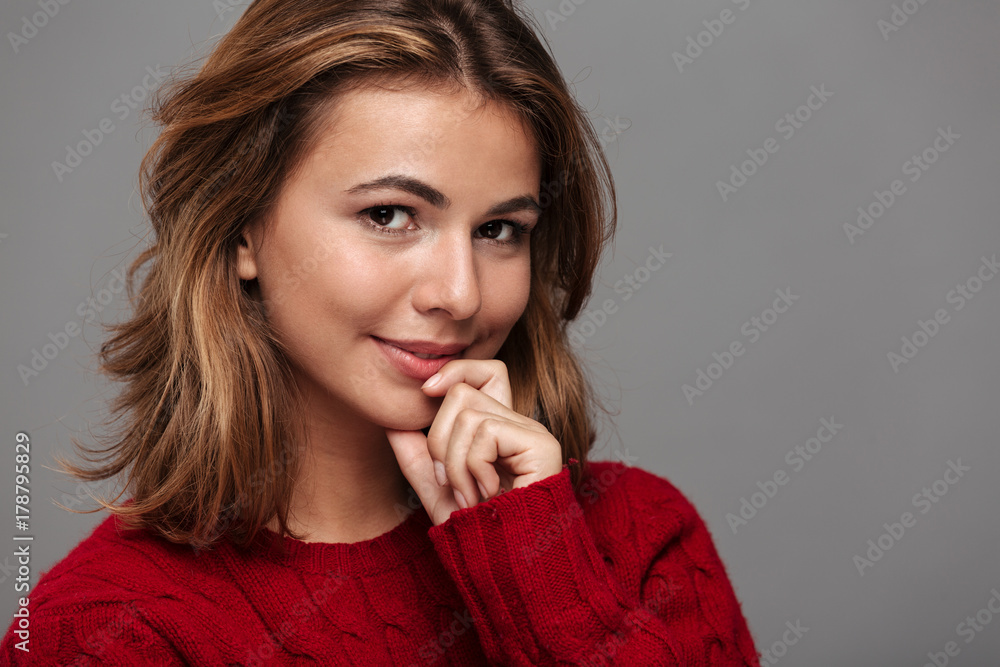 Close up portrait of a lovely girl in red sweater Close up portrait of a lovely girl in red sweater