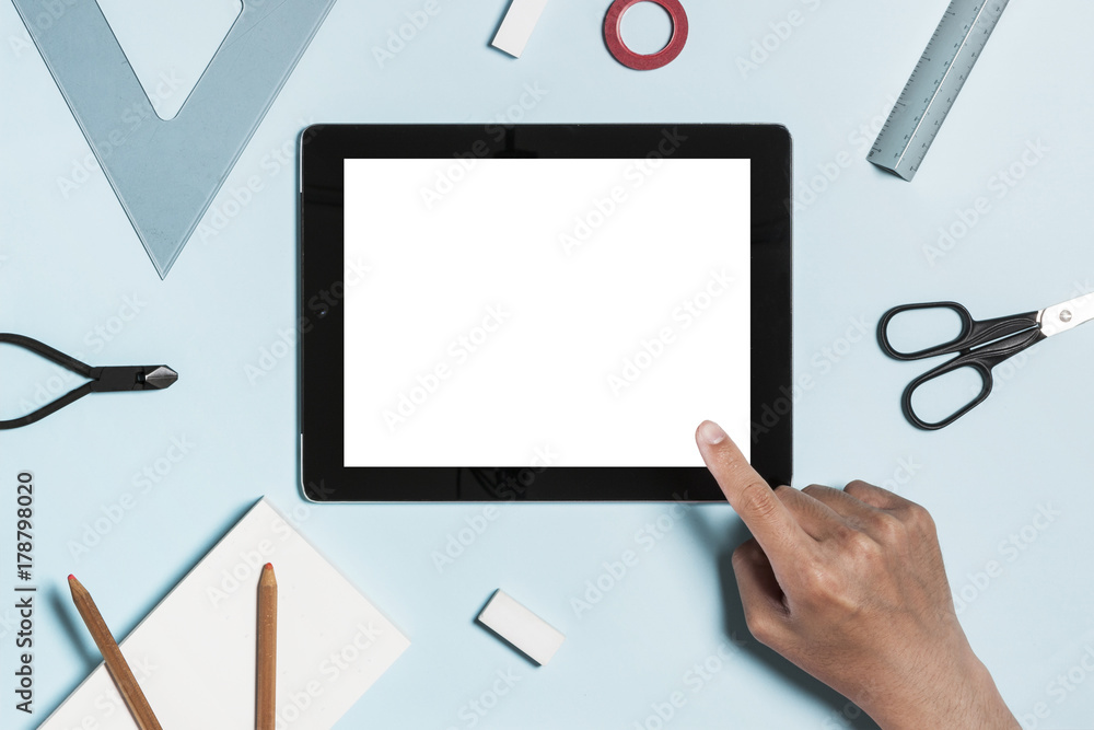 digital device with stationary on the blue background. digital device with stationary on the blue background.