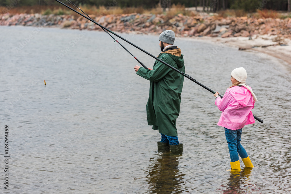father and daughter fishing together father and daughter fishing together