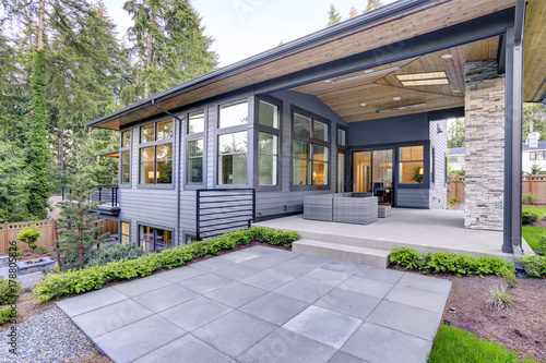 New modern home features a backyard with patio © Iriana Shiyan