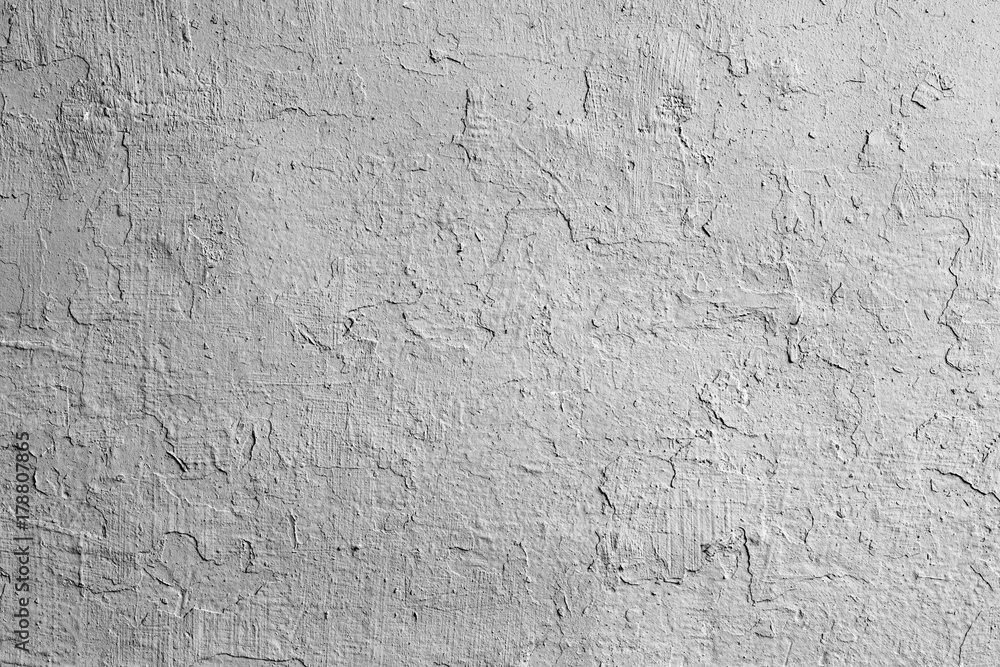 Fototapeta premium Wall fragment with scratches and cracks
