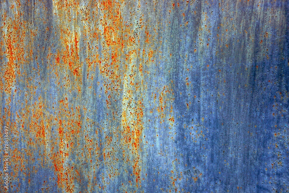 Серо коричневый фон в ржавчине  из фрагмента стены из железа