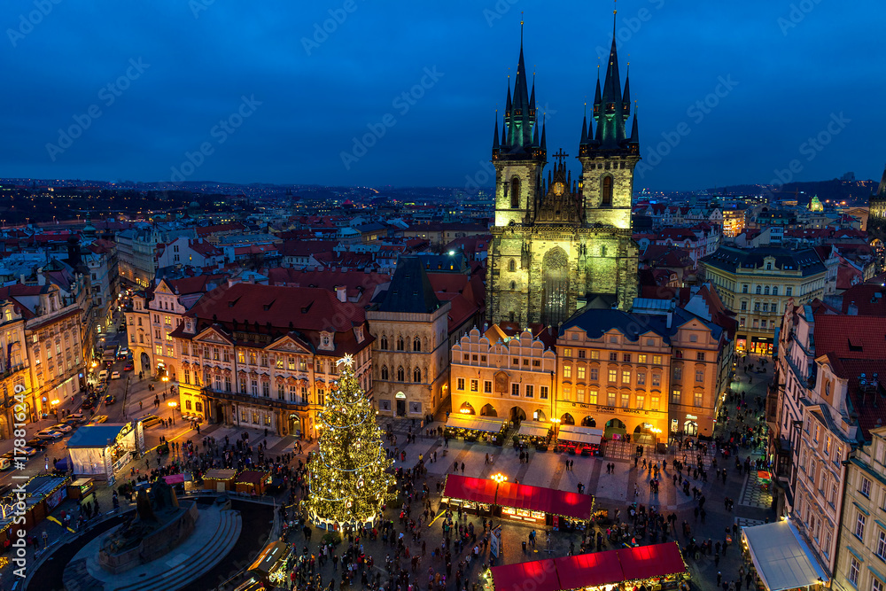 Old Town Square and Christmas market at evening in Prague.