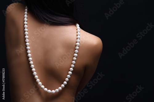 Canvastavla Portrait of beautiful nude long straight black hair woman with pearl necklace