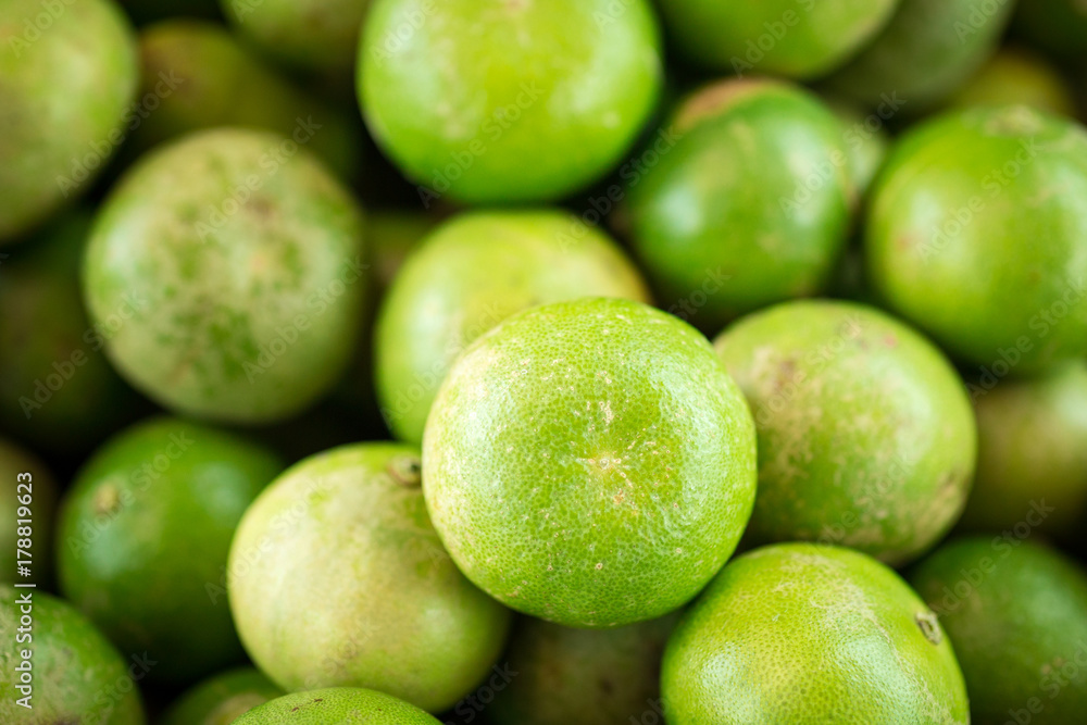 Fresh green lemon background Fresh green lemon background