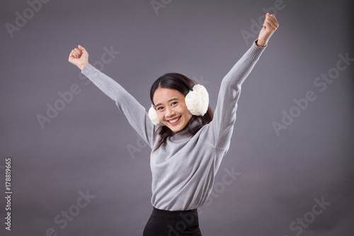 happy exited successful asian woman