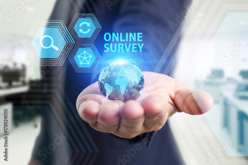 Wallpaper Mural The concept of business, technology, the Internet and the network. A young entrepreneur working on a virtual screen of the future and sees the inscription: Online survey Torontodigital.ca