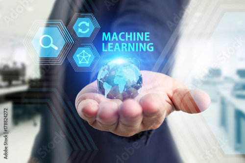 Wallpaper Mural The concept of business, technology, the Internet and the network. A young entrepreneur working on a virtual screen of the future and sees the inscription: Machine learning Torontodigital.ca