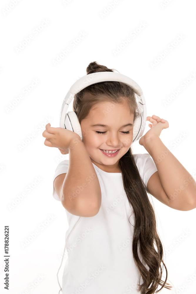 smiling child in headphones