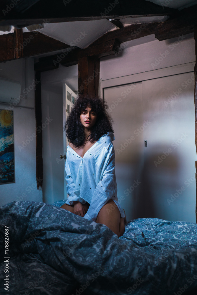 Fototapeta premium Attractive woman on bed