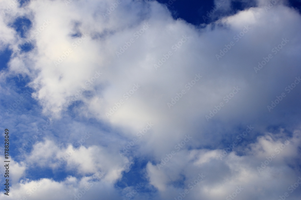 Clouds in the blue sky. Background, texture.