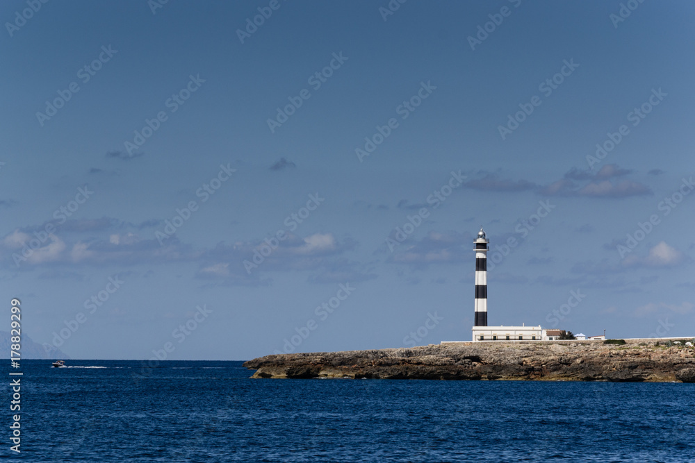 Lighthouse on the beach of Cala en Bosch - Menorca - Spain