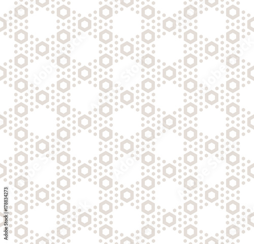 Hexagon texture, vector seamless pattern in pastel colors, beige and white. Ornamental background pattern.