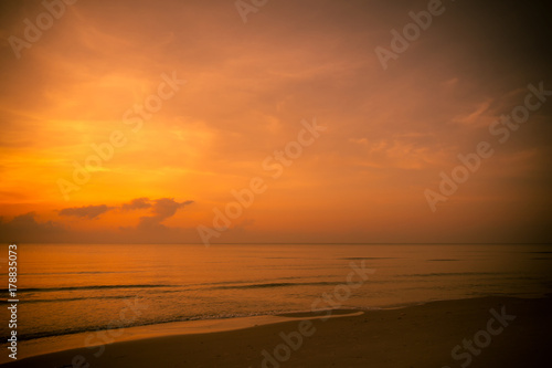 Golden sun set in tropical hot summer beach in thailand, golden special effect.