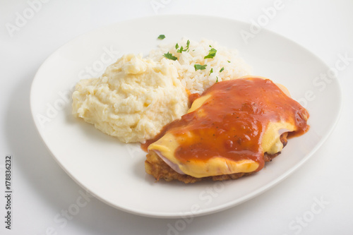 Chicken Fillet with rice and Mushed Potatoes. Parmegiana Fillet