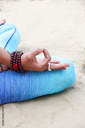 yoga lotus position on beach background copy space calm beach ocean