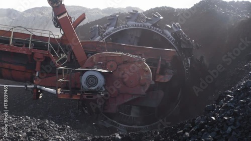 detail of huge coal excavator mining wheel