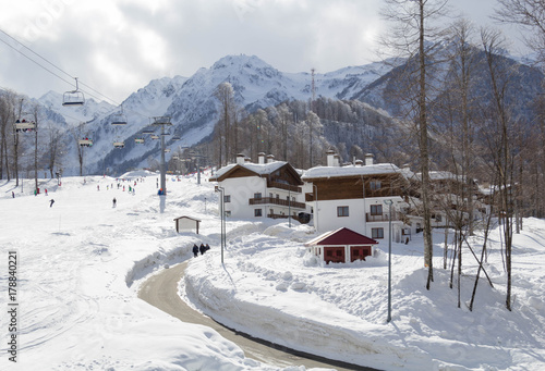 Snow-covered cottages at the Sochi photo