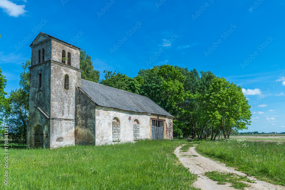 Deteriorated abandoned haunted old church. Dobele, Latvia