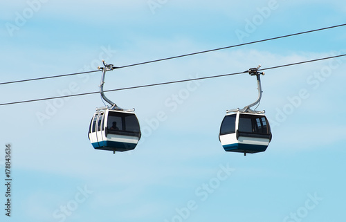 Passenger cable way cabins in the sky.
