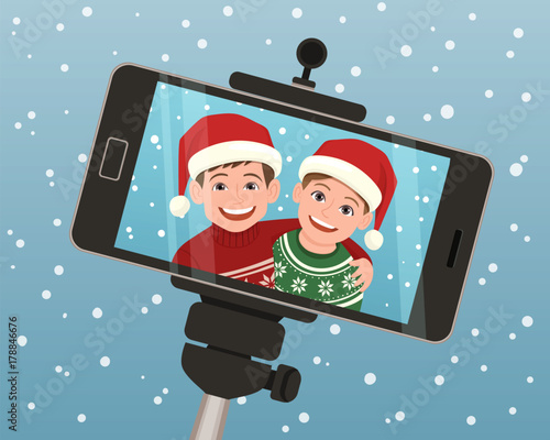 Selfie capture taken with a smartphone of two smiley kids wearing a Santa Claus hat. Vector illustration.