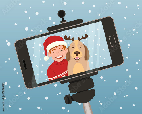 Smartphone christmas portrait of a boy with his dog. The boy is wearing a christmas hat and the dog wears a diadem with reindeer horns. Vector illustration.