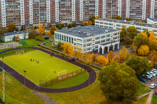 Photography City landscape with school and football field in autumn in Moscow, Russia