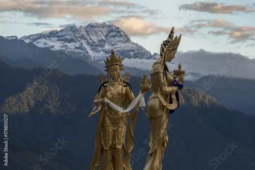 Goddesses at Sunrise, Himalayas in Background, Bhutan photo