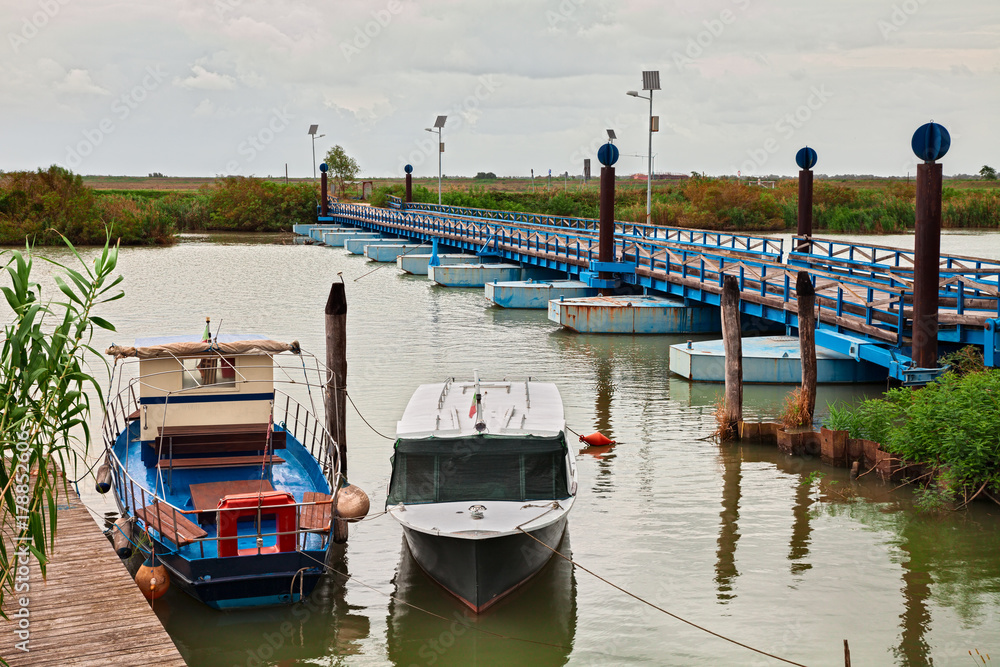 Porto Tolle, Veneto, Italy: the floating bridge over the river in the Po Delta Park