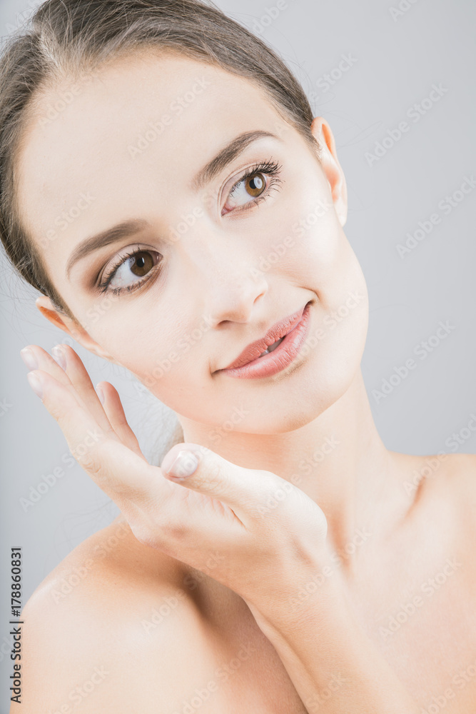 a beauty girl on a gray background a beauty girl on a gray background