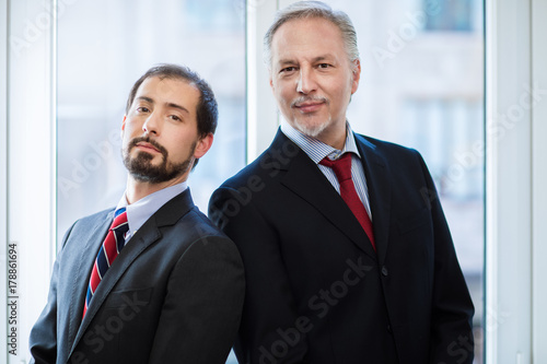 Twp businessmen portrait