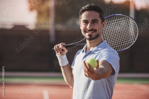 Man playing tennis © georgerudy