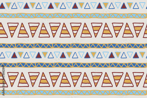 Geometric seamless pattern with brown and blue hand drawn triangles, vector. There is a swatch in the panel. The elements are not cut off and hidden under mask